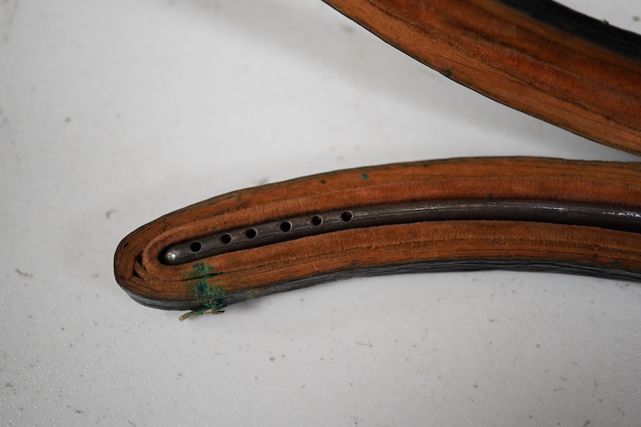 A late 19th century leather cased medical set of catheter surgical instruments, together with a single leather case catheter, plus an early 20th century canvas roll containing a graduated set of gynaecological surgical i